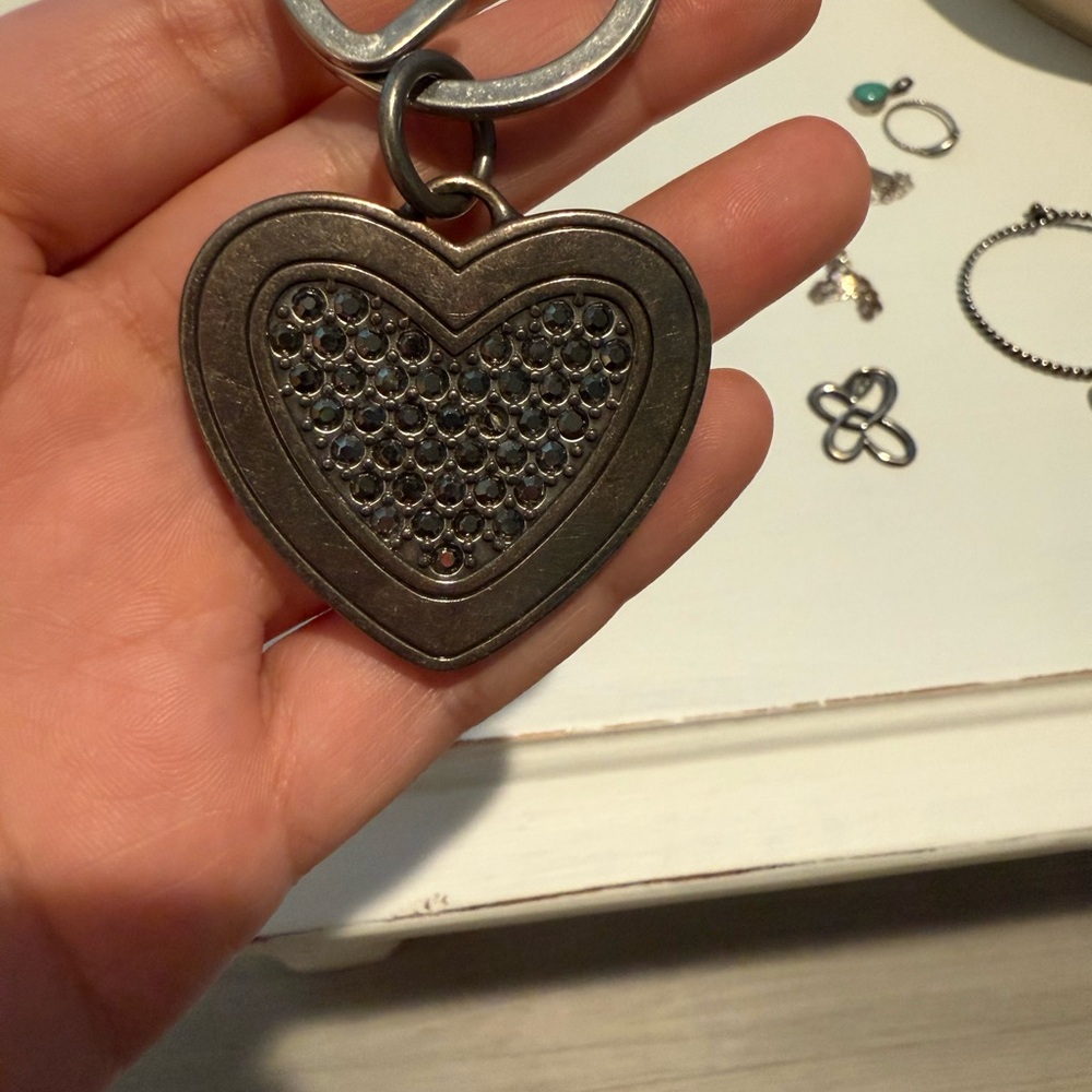 Fossil Heart-Shaped Keychain with Black Accents
